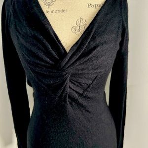 Black v neck cashmere sweater.
